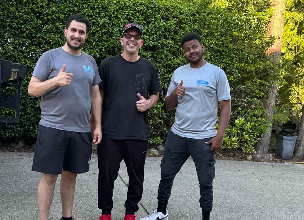 Professional house moving service in Langley loading household furniture safely